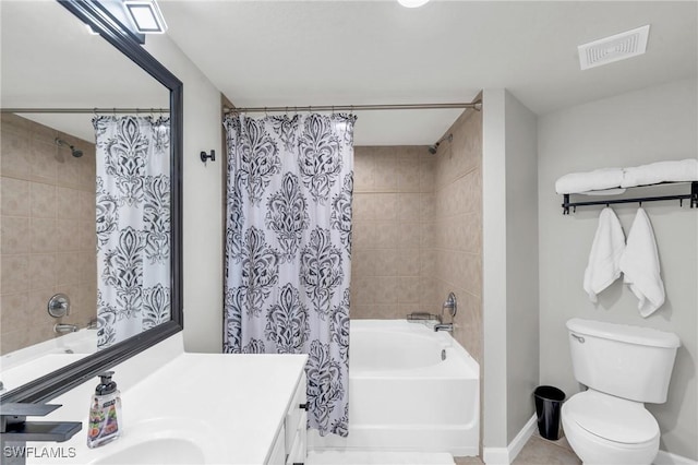 full bathroom with toilet, tile patterned floors, shower / bath combo, and vanity