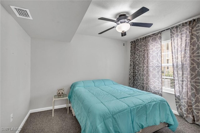 carpeted bedroom featuring ceiling fan