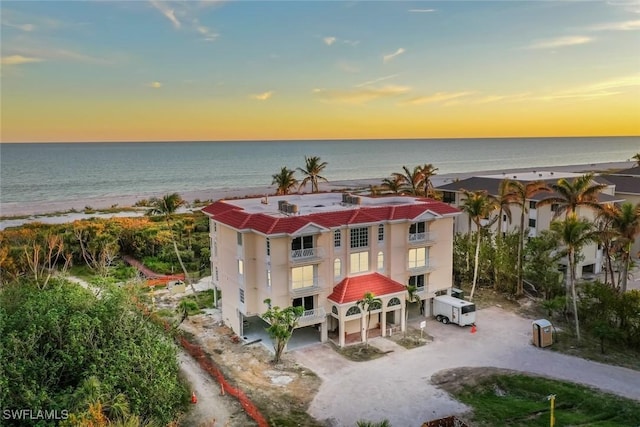 property view of water featuring a beach view