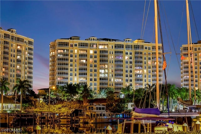 view of outdoor building at dusk