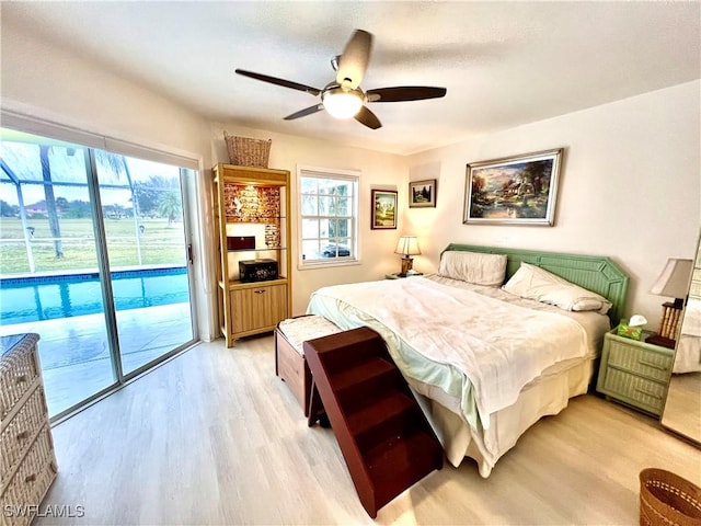 bedroom with ceiling fan, light hardwood / wood-style floors, and access to outside