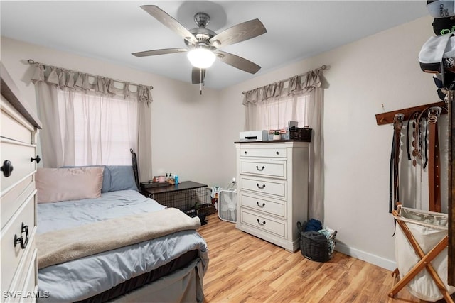 bedroom featuring ceiling fan and light hardwood / wood-style floors