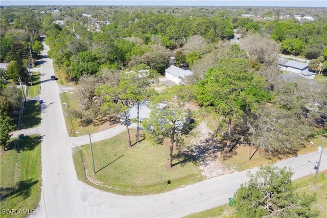 bird's eye view featuring a view of trees