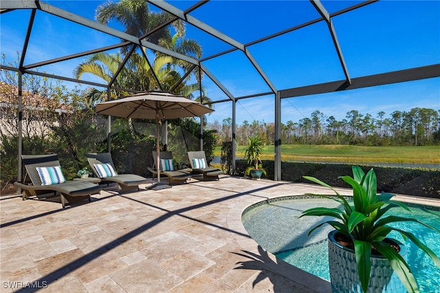 view of patio / terrace featuring glass enclosure