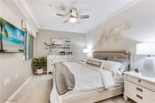 bedroom featuring crown molding, light colored carpet, and ceiling fan