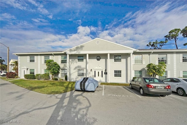 view of front of property with a front lawn