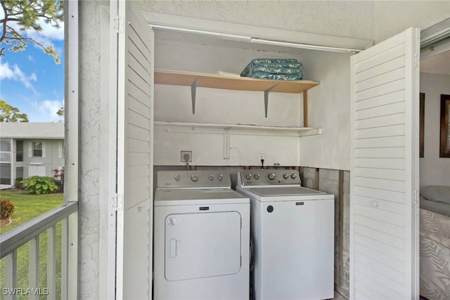 laundry area with washer and dryer