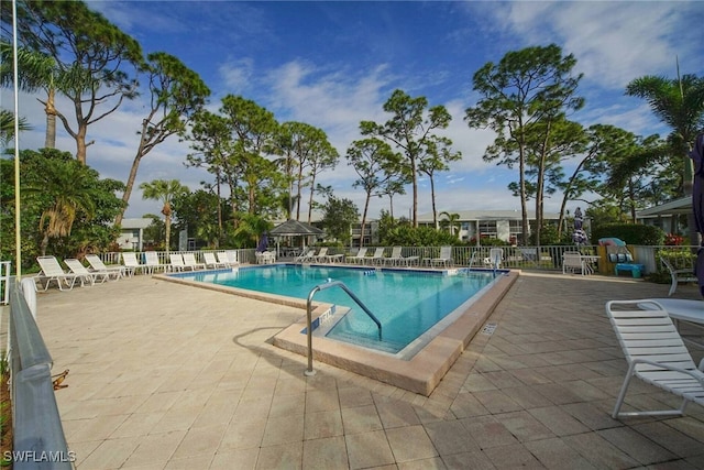 view of pool with a patio area and a gazebo