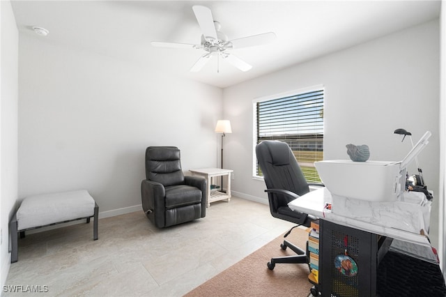 tiled office space with ceiling fan