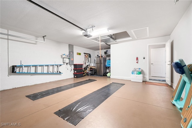 garage featuring stainless steel fridge, a garage door opener, and electric panel