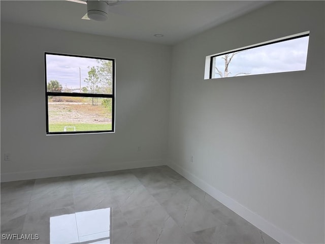 empty room featuring ceiling fan