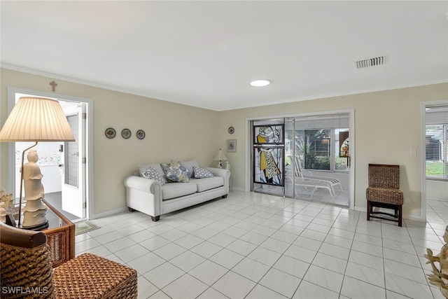 tiled living room with crown molding