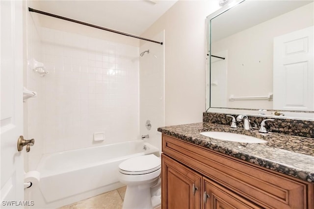 bathroom featuring shower / washtub combination, vanity, toilet, and tile patterned floors