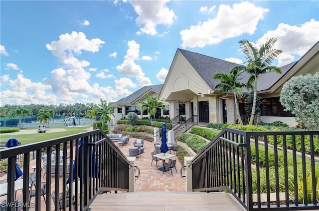 exterior space featuring an outdoor living space and a patio