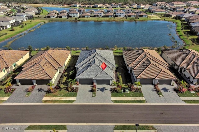 drone / aerial view featuring a water view