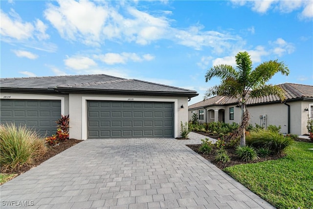 view of front of property with a garage