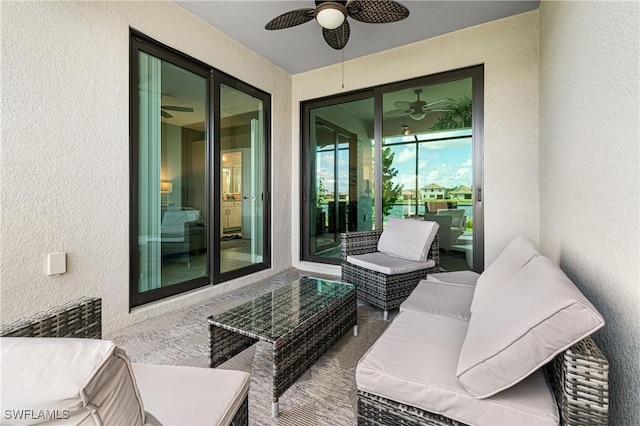 view of patio featuring an outdoor living space and ceiling fan