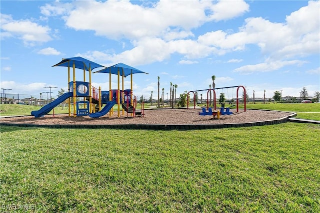 view of playground featuring a yard