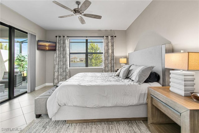 bedroom featuring light tile patterned floors, ceiling fan, and access to exterior