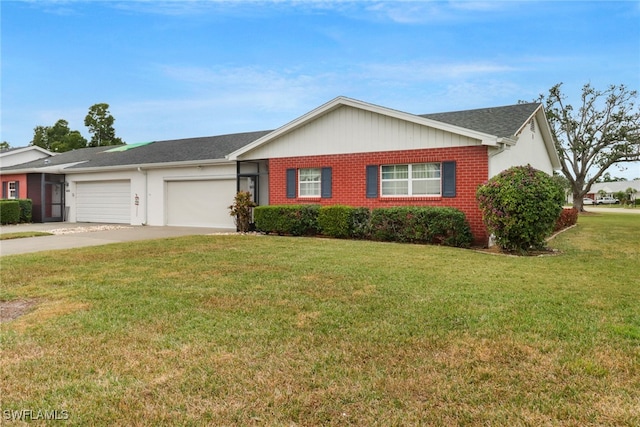 single story home with a garage and a front lawn