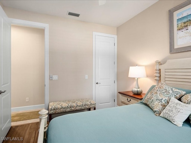 bedroom featuring hardwood / wood-style flooring