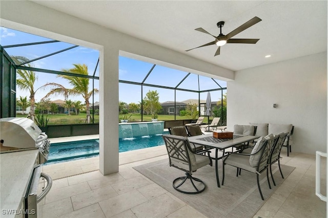 view of patio with area for grilling, pool water feature, ceiling fan, and glass enclosure