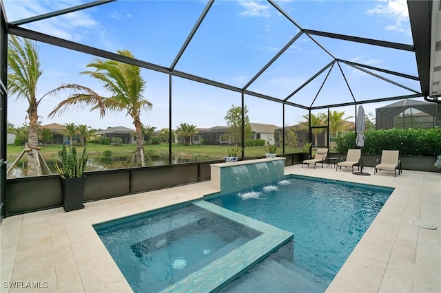 view of pool featuring an in ground hot tub, pool water feature, glass enclosure, and a patio