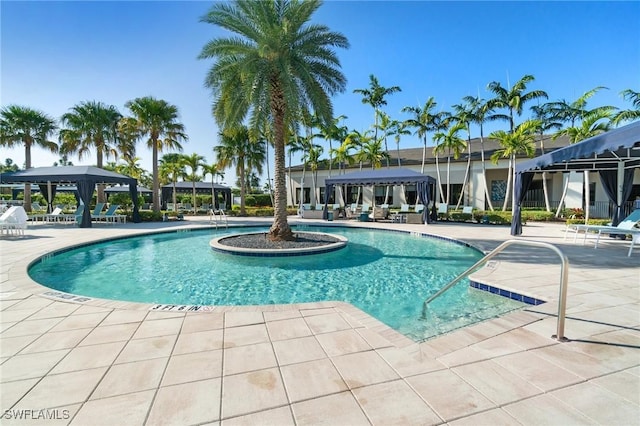 community pool featuring a patio area and a gazebo