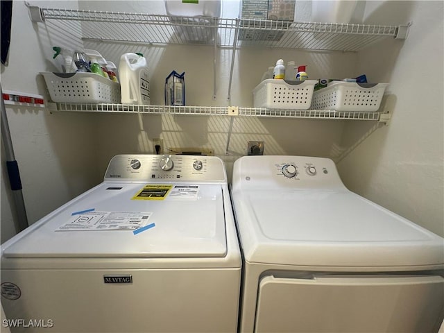 laundry area featuring independent washer and dryer