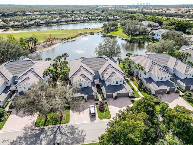 9181 Palmetto Ridge Dr Unit 202, Estero, FL 34135 - aerial view of residential area with a large body of water and a local golf course