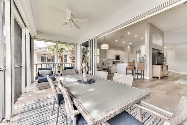 interior space featuring ceiling fan and light hardwood / wood-style flooring