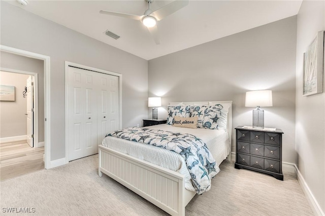 bedroom featuring ceiling fan, carpet floors, and a closet