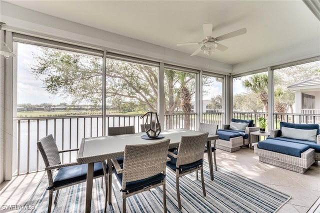 sunroom / solarium with ceiling fan