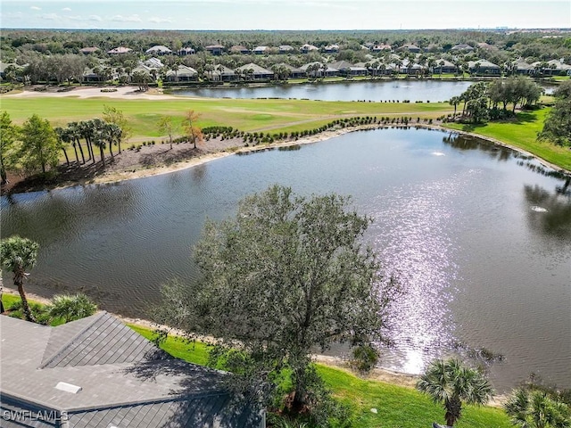 bird's eye view with a water view