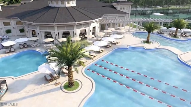 view of swimming pool with a patio area