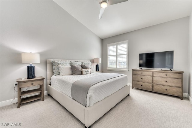 bedroom featuring vaulted ceiling, carpet flooring, and ceiling fan