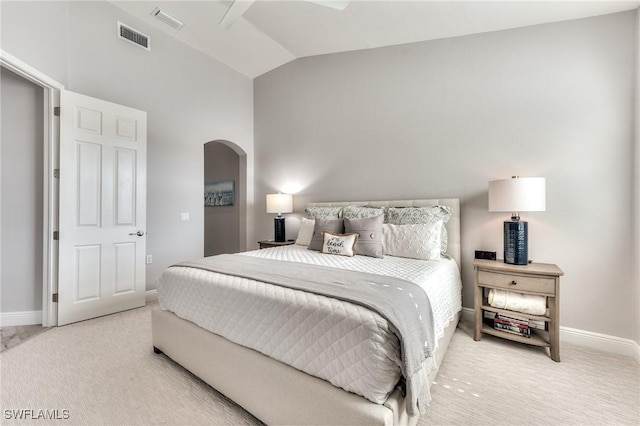 bedroom featuring lofted ceiling and carpet floors