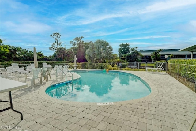 view of pool with a patio area