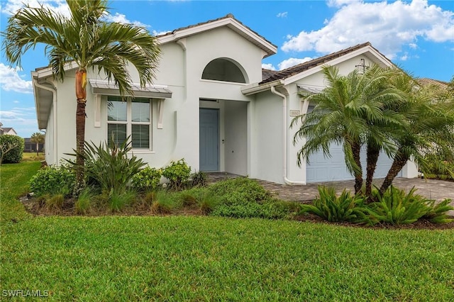 8880 Redonda Dr, Naples, FL 34114 - view of front of home with a front yard