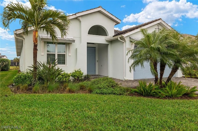 view of front of home with a front yard