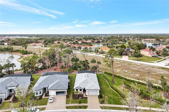 drone / aerial view featuring a water view