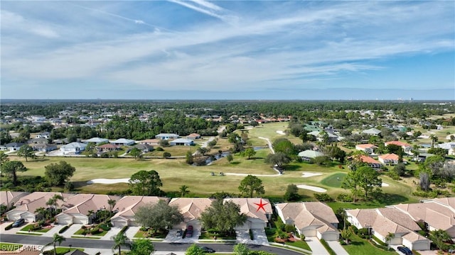 bird's eye view with a residential view and view of golf course