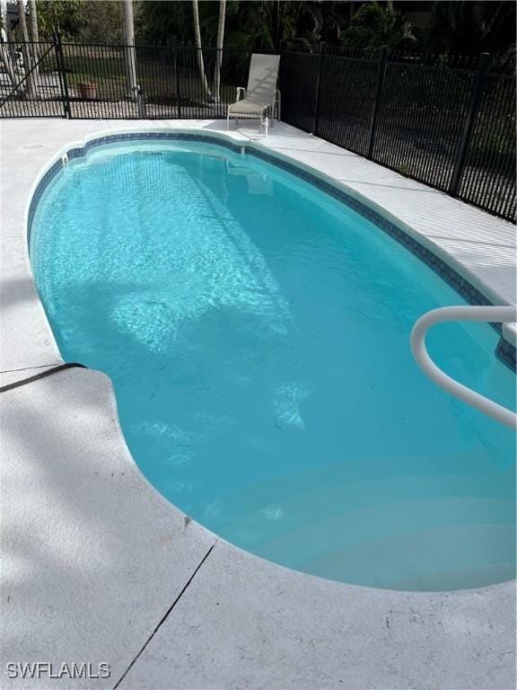 view of pool featuring fence and a fenced in pool