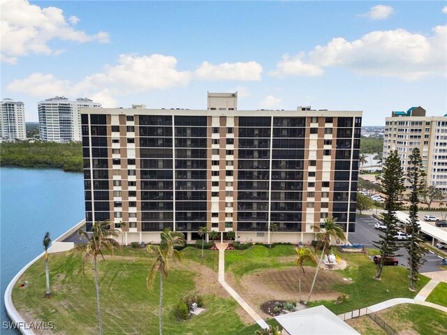 view of building exterior featuring a water view