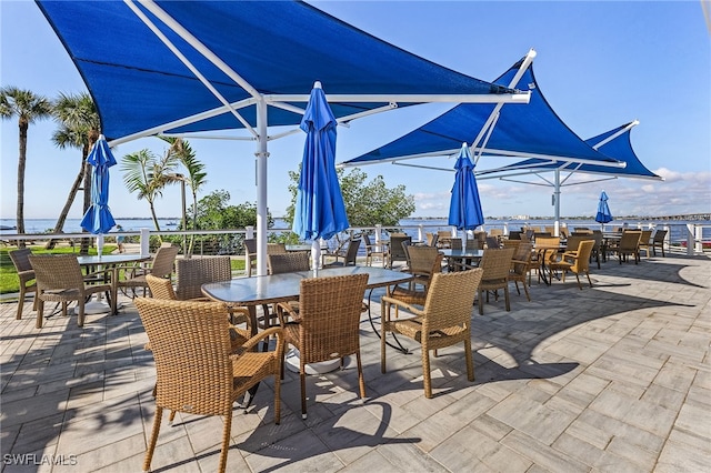 view of patio / terrace featuring a water view