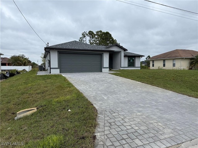 ranch-style house with a front yard and a garage