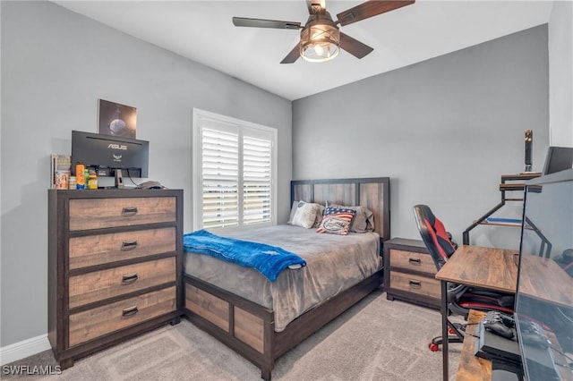 carpeted bedroom featuring ceiling fan