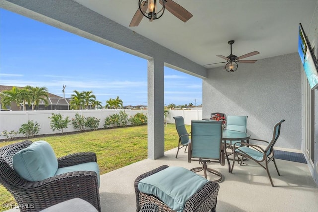 view of patio / terrace featuring ceiling fan