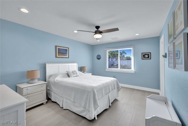 bedroom featuring ceiling fan and light wood-type flooring