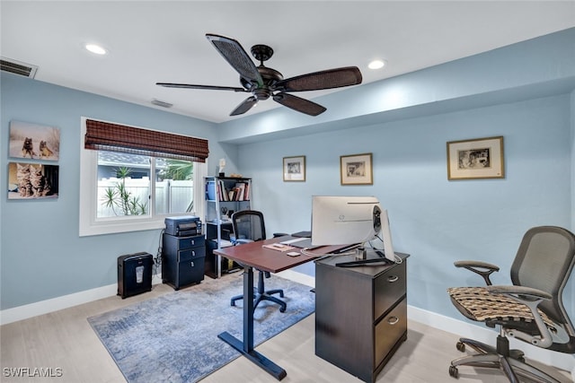 office area featuring light hardwood / wood-style floors and ceiling fan